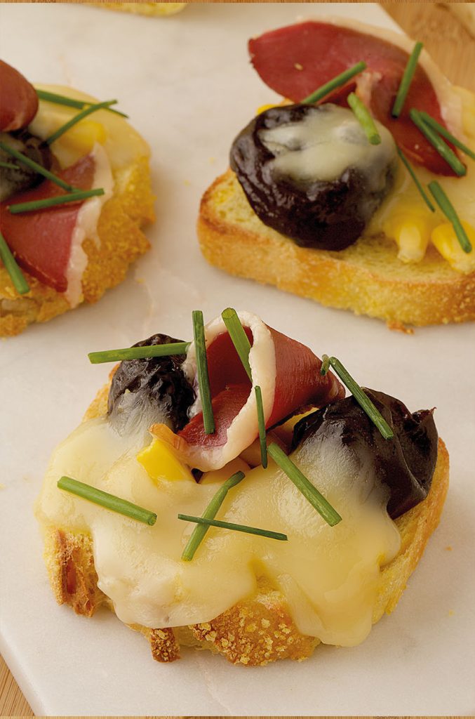 Grilled Jaunette Jurassic and smoked Duck breast on Cornbread